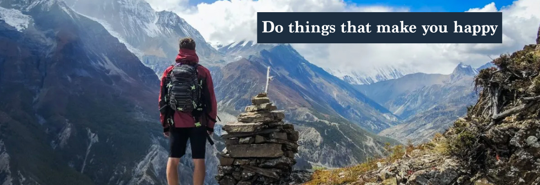 Do what makes you happy, a trekker looking at mountains